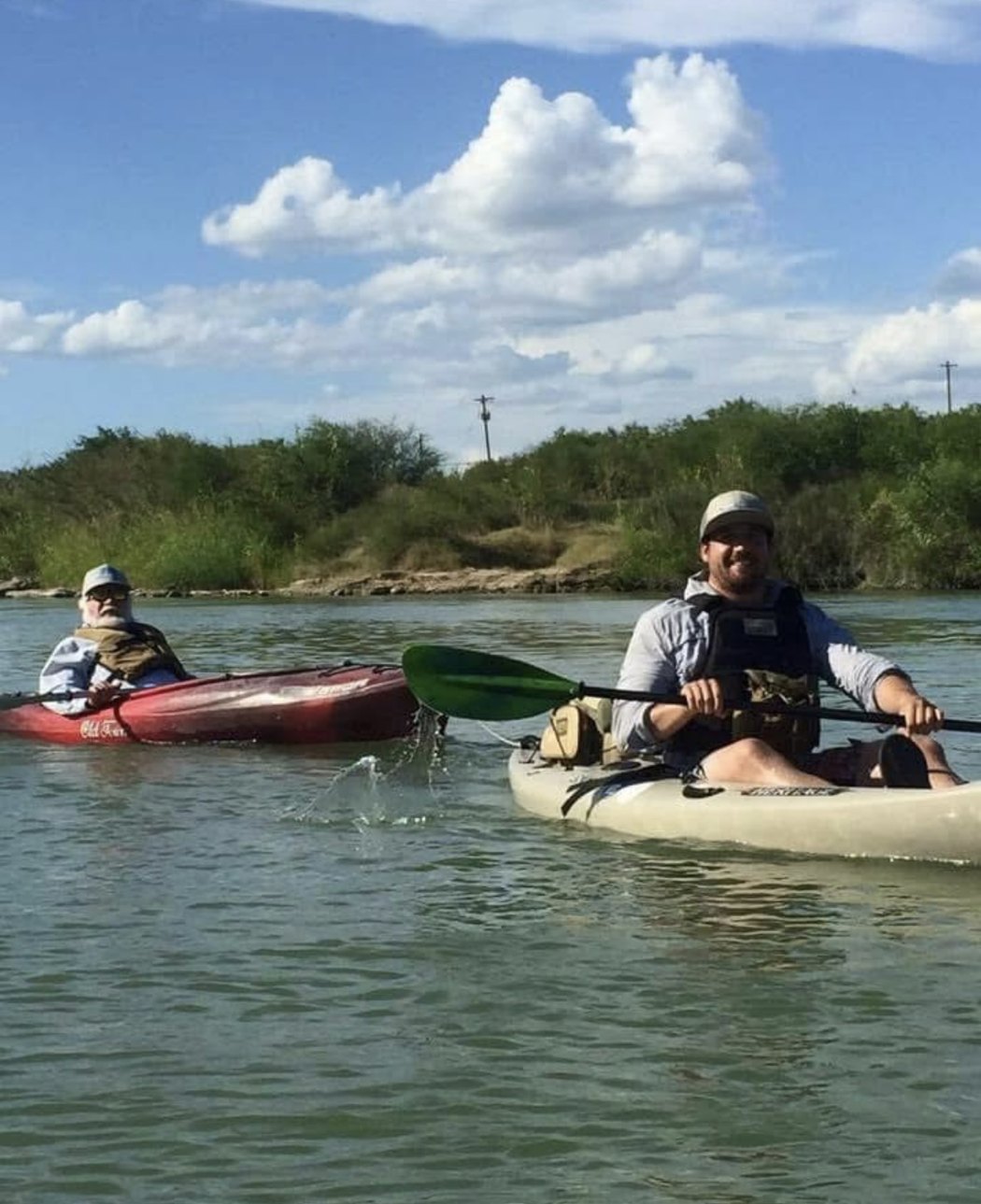 Frank and his father kayaking together