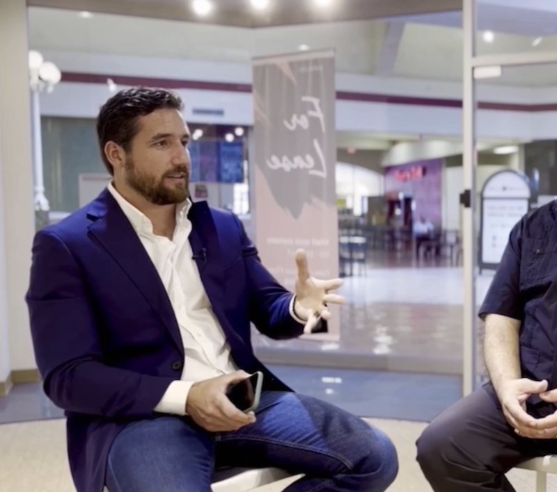 Frank Flores in conversation at the mall during his JLL years